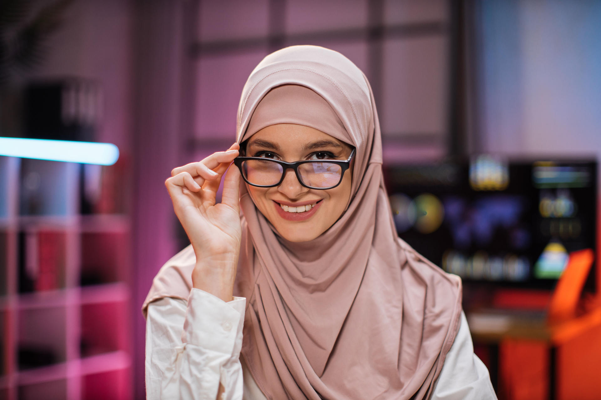 smiling-positive-confident-woman-in-formal-wear-an-2024-12-13-10-50-44-utc.jpg